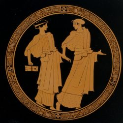 Two girls with a writing tablet, pictured on a terracotta kylix.